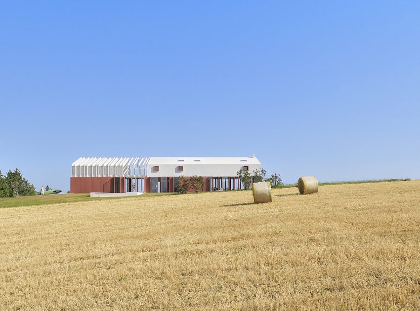 A Bright Long and Narrow Home with Contemporary and Permeable Facade in Polverigi, Italy by simone subissati architects (3)