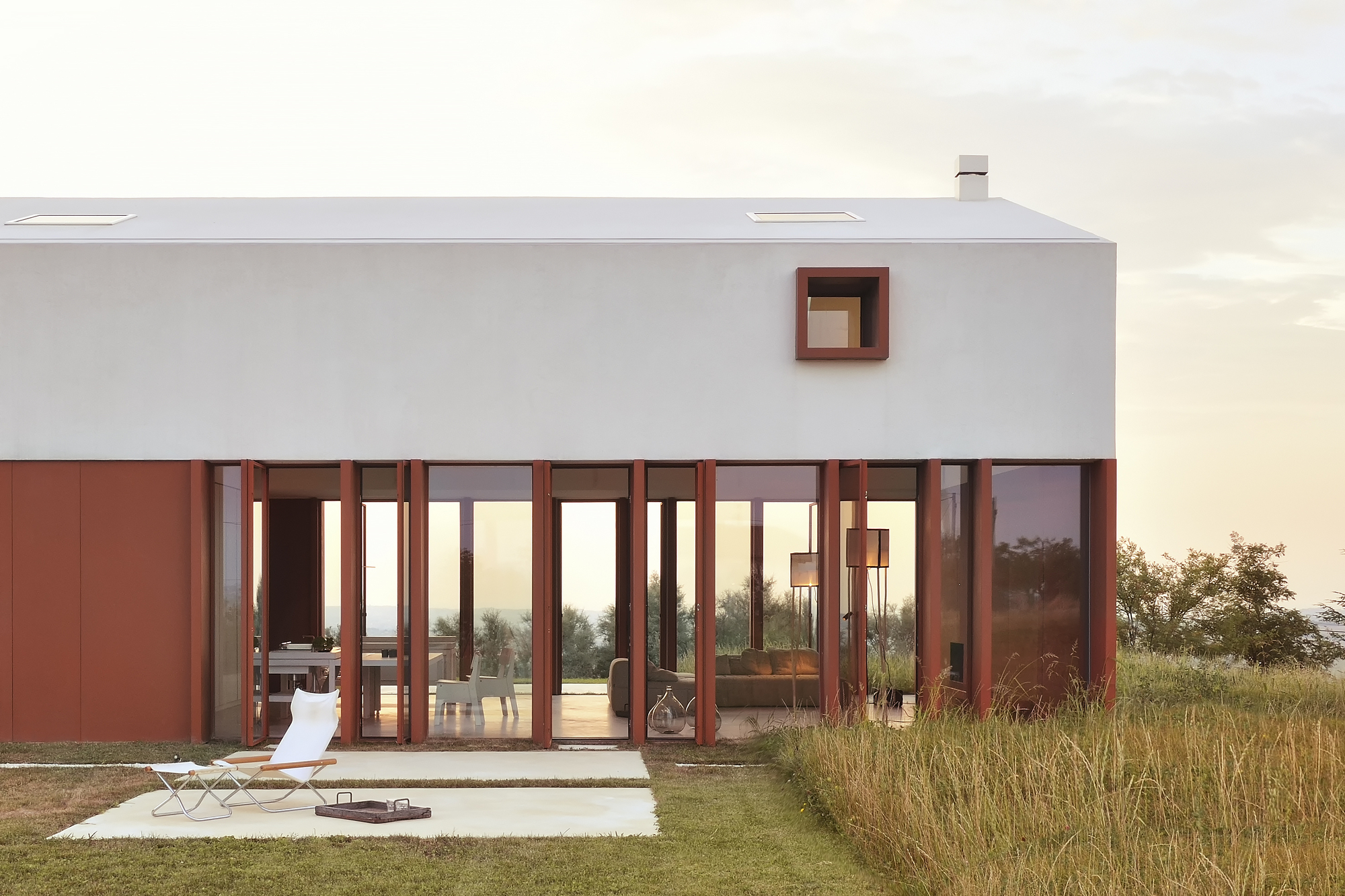 A Bright Long and Narrow Home with Contemporary and Permeable Facade in Polverigi, Italy by simone subissati architects (6)