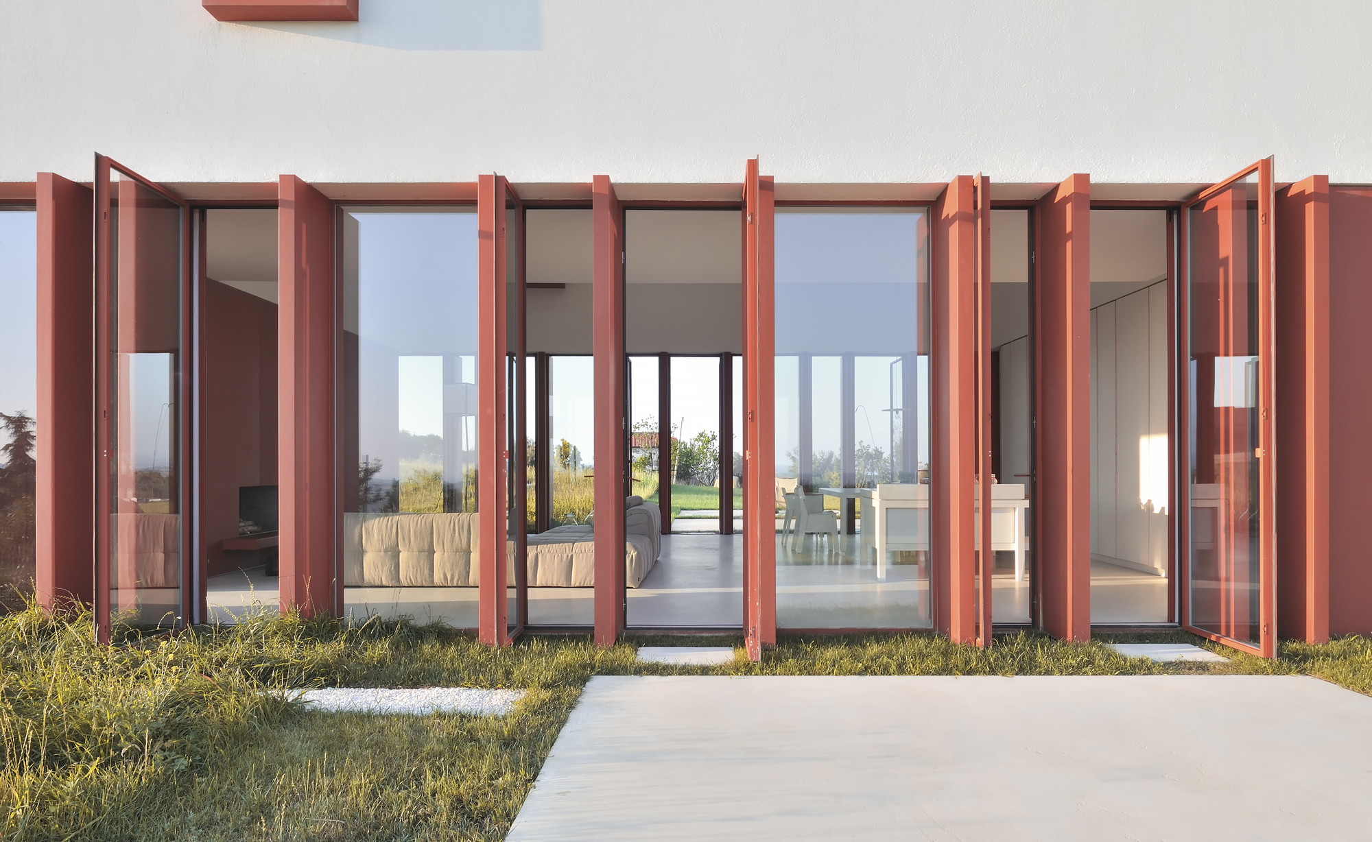 A Bright Long and Narrow Home with Contemporary and Permeable Facade in Polverigi, Italy by simone subissati architects (9)