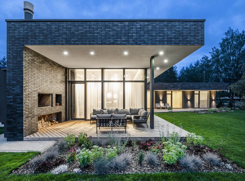 A Bright Modern L-Shaped Home Blends with Stunning Natural Surroundings in Vilnius, Lithuania by ArchLAB studio (8)