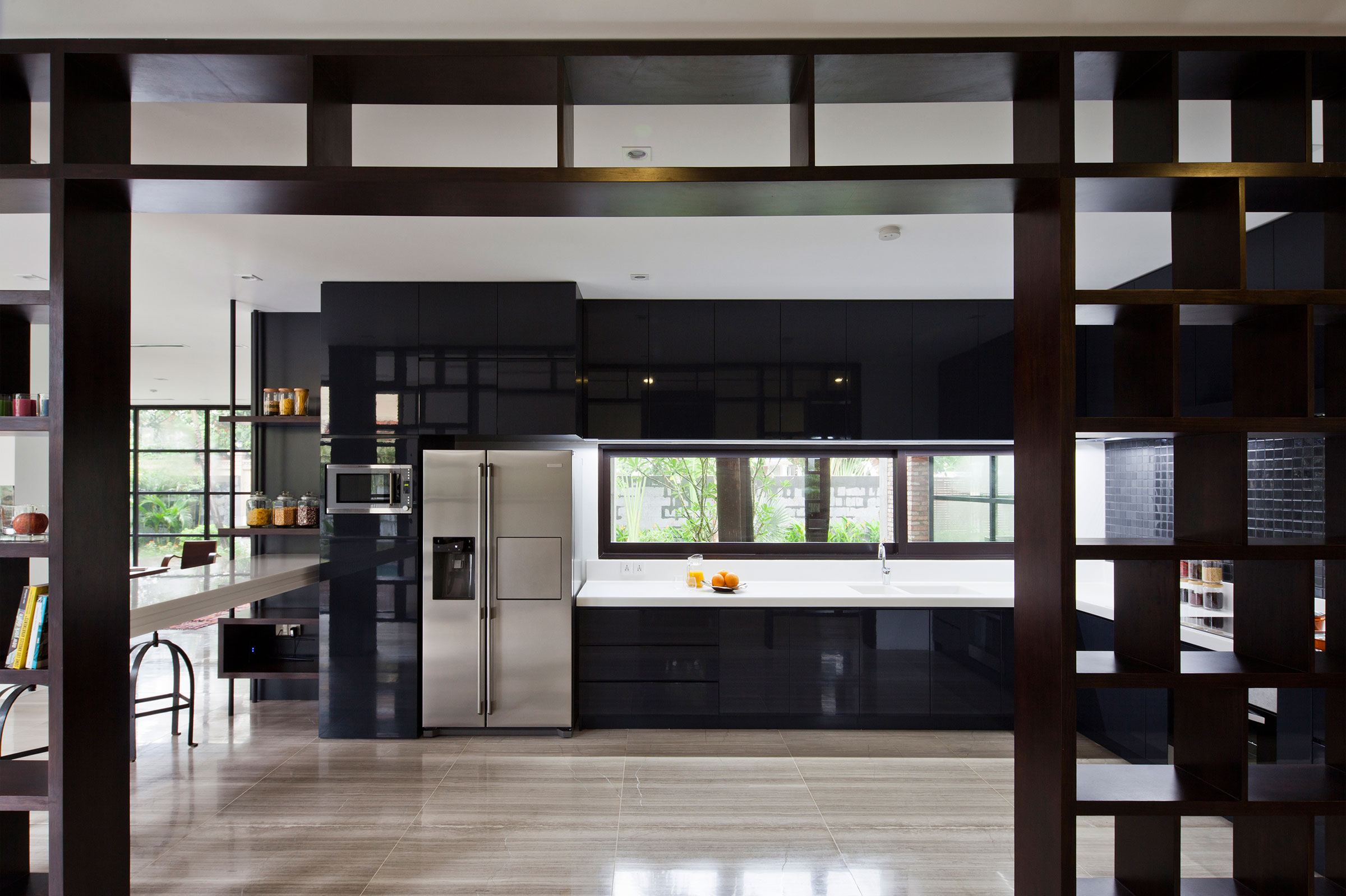 A Contemporary Home with Recycled Bricks, Concrete and Steel Frame Windows in Thao Dien by MM ++ Architects (11)