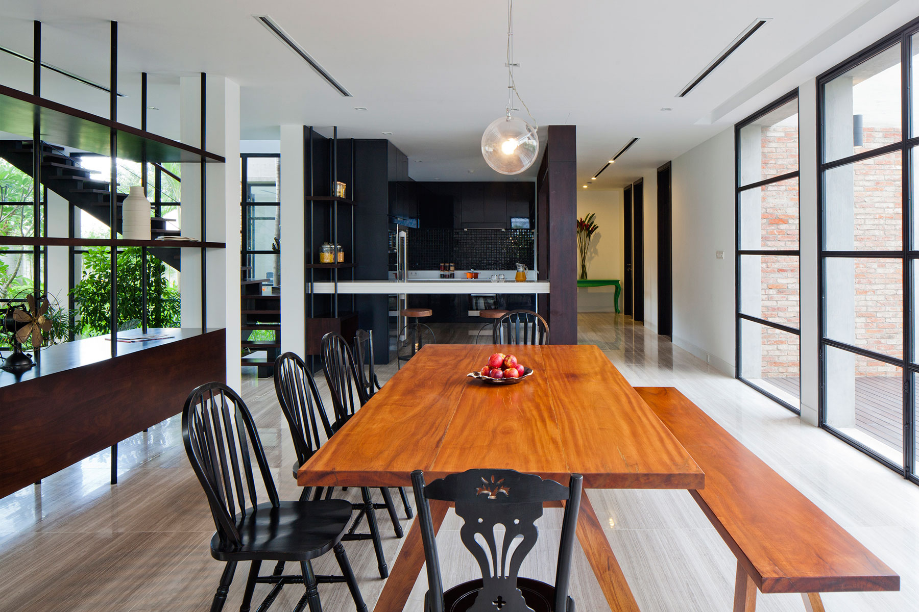 A Contemporary Home with Recycled Bricks, Concrete and Steel Frame Windows in Thao Dien by MM ++ Architects (14)