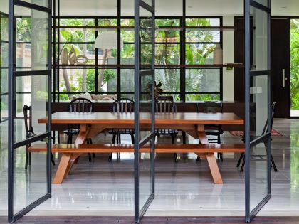 A Contemporary Home with Recycled Bricks, Concrete and Steel Frame Windows in Thao Dien by MM ++ Architects (15)