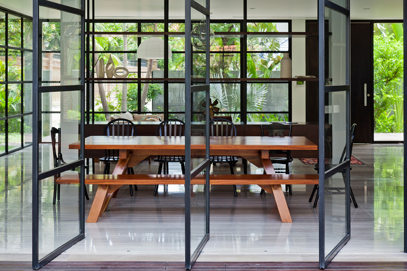 A Contemporary Home with Recycled Bricks, Concrete and Steel Frame Windows in Thao Dien by MM ++ Architects (15)