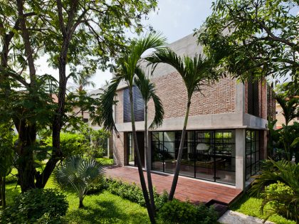 A Contemporary Home with Recycled Bricks, Concrete and Steel Frame Windows in Thao Dien by MM ++ Architects (2)
