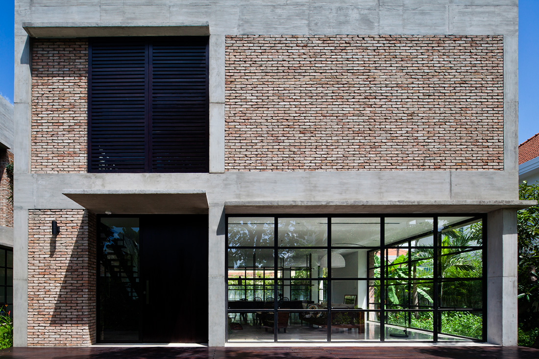 A Contemporary Home with Recycled Bricks, Concrete and Steel Frame Windows in Thao Dien by MM ++ Architects (3)