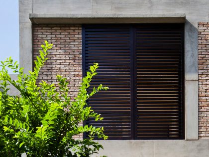 A Contemporary Home with Recycled Bricks, Concrete and Steel Frame Windows in Thao Dien by MM ++ Architects (4)