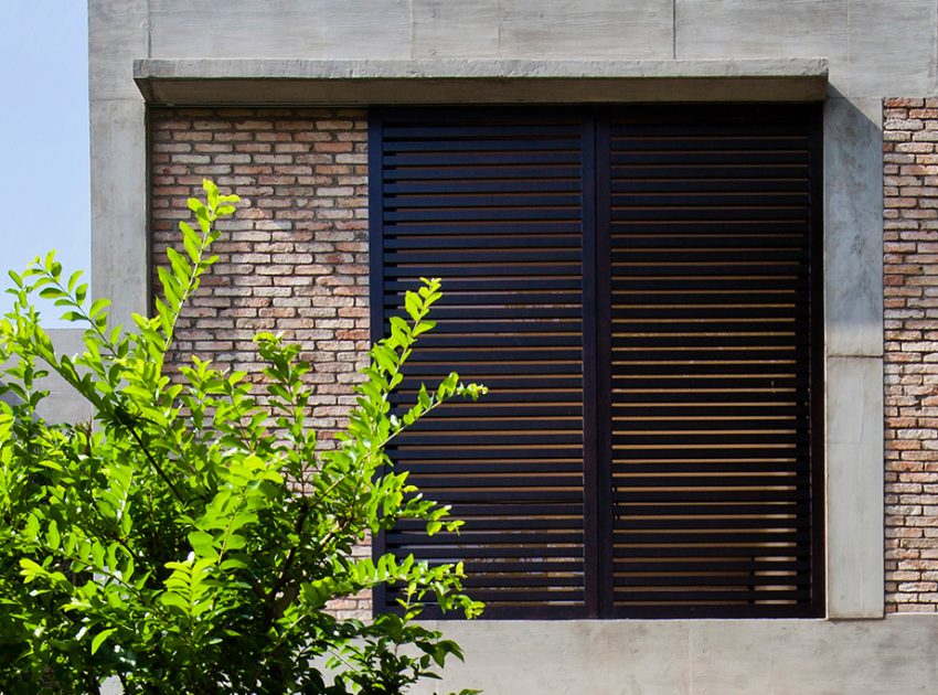 A Contemporary Home with Recycled Bricks, Concrete and Steel Frame Windows in Thao Dien by MM ++ Architects (4)