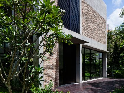 A Contemporary Home with Recycled Bricks, Concrete and Steel Frame Windows in Thao Dien by MM ++ Architects (5)