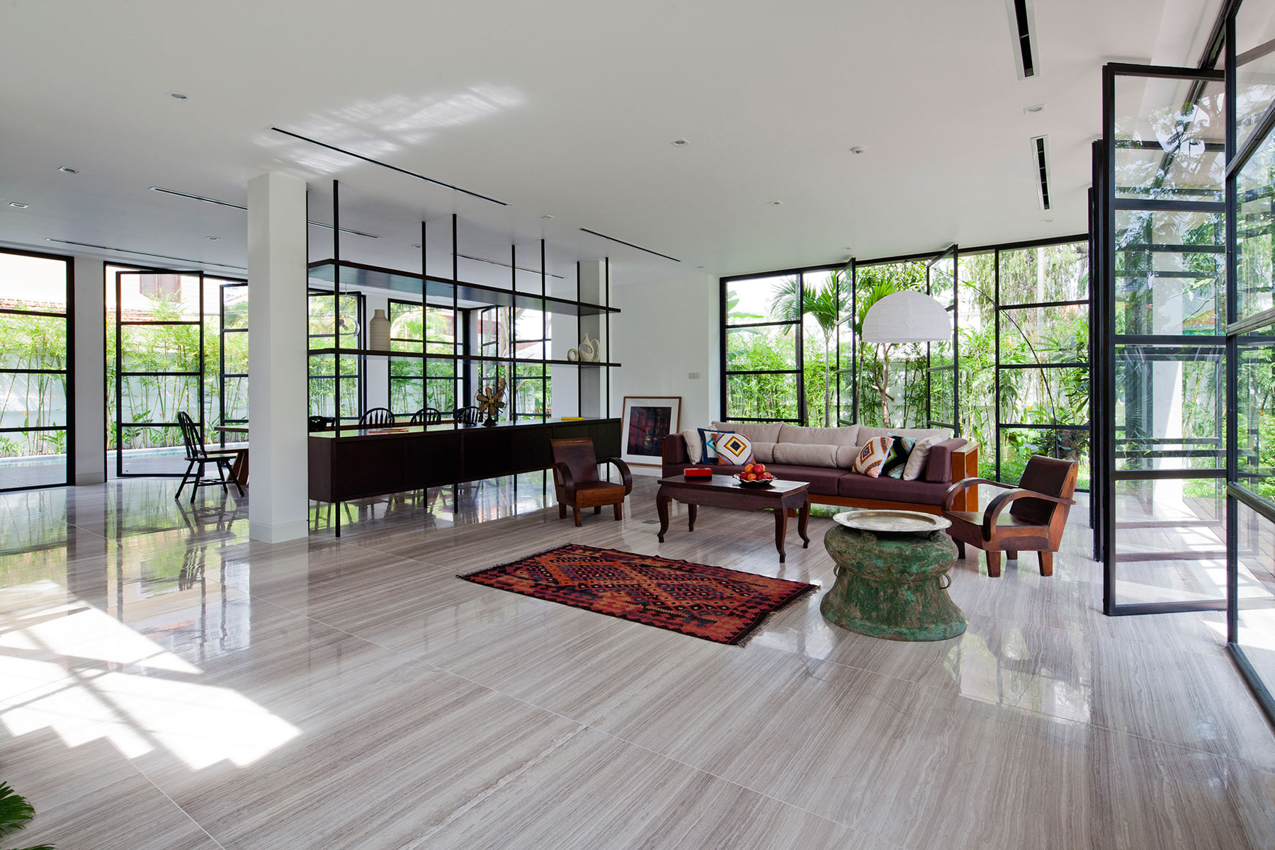 A Contemporary Home with Recycled Bricks, Concrete and Steel Frame Windows in Thao Dien by MM ++ Architects (6)