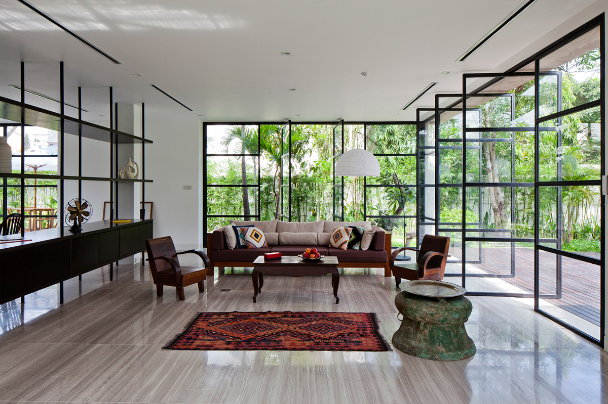 A Contemporary Home with Recycled Bricks, Concrete and Steel Frame Windows in Thao Dien by MM ++ Architects (9)