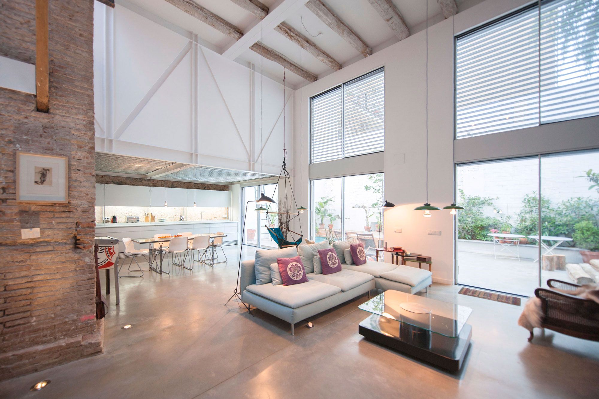 A Former Milk Shop Turned into a Bright Modern Industrial Home in Barcelona by Lluís Corbella & Marc Mazeres (2)