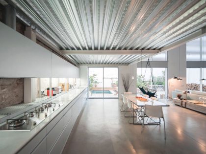 A Former Milk Shop Turned into a Bright Modern Industrial Home in Barcelona by Lluís Corbella & Marc Mazeres (6)