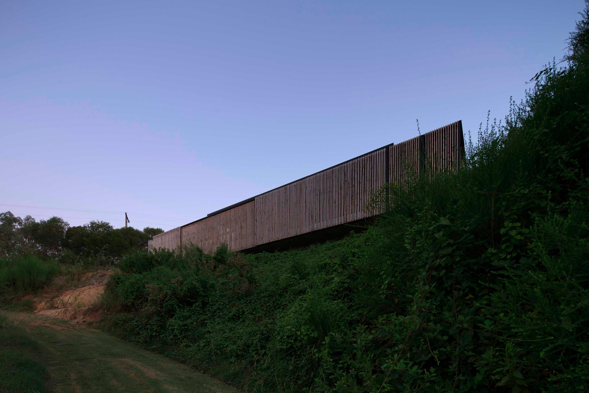 A Modern House Built From Reclaimed Concrete Blocks and Rough-Sawn Wood in Yackandandah, Australia by ARCHIER (1)
