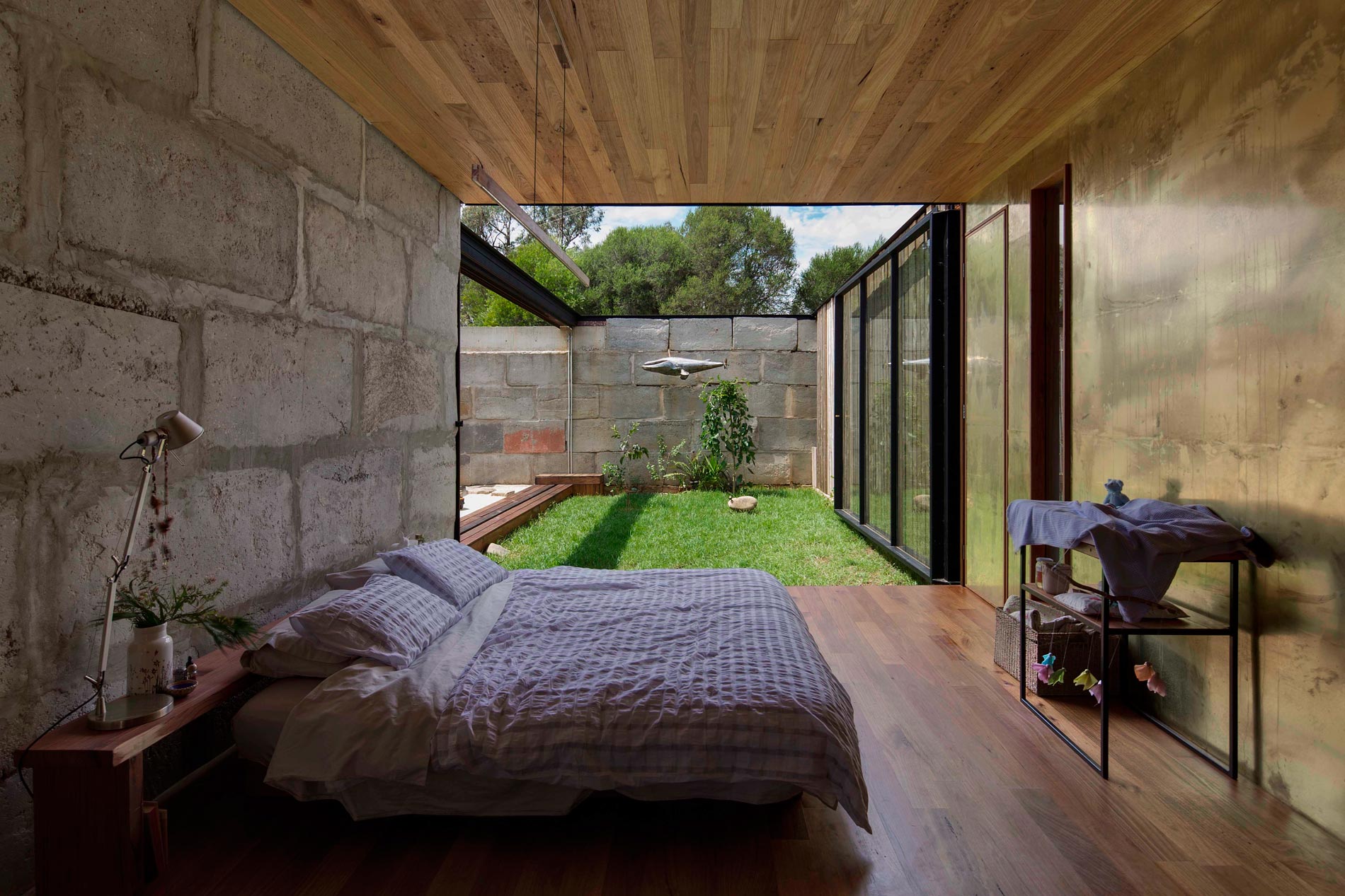 A Modern House Built From Reclaimed Concrete Blocks and Rough-Sawn Wood in Yackandandah, Australia by ARCHIER (26)