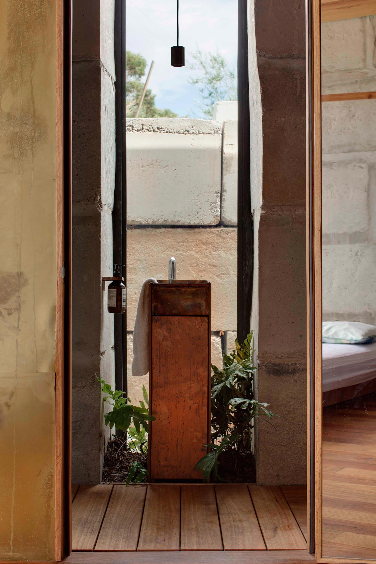 A Modern House Built From Reclaimed Concrete Blocks and Rough-Sawn Wood in Yackandandah, Australia by ARCHIER (30)