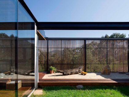 A Modern House Built From Reclaimed Concrete Blocks and Rough-Sawn Wood in Yackandandah, Australia by ARCHIER (6)