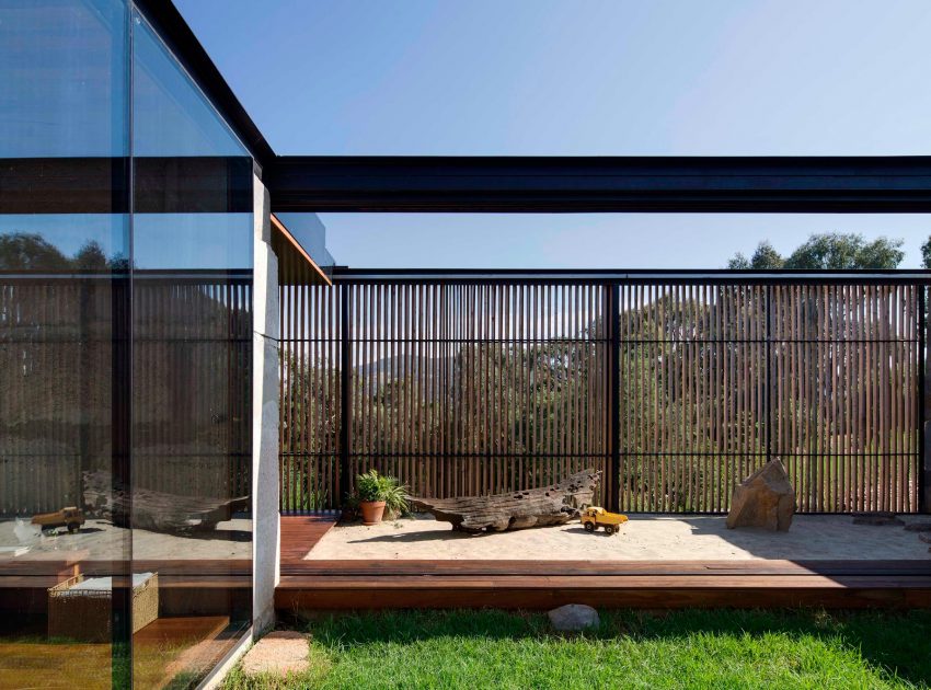 A Modern House Built From Reclaimed Concrete Blocks and Rough-Sawn Wood in Yackandandah, Australia by ARCHIER (6)