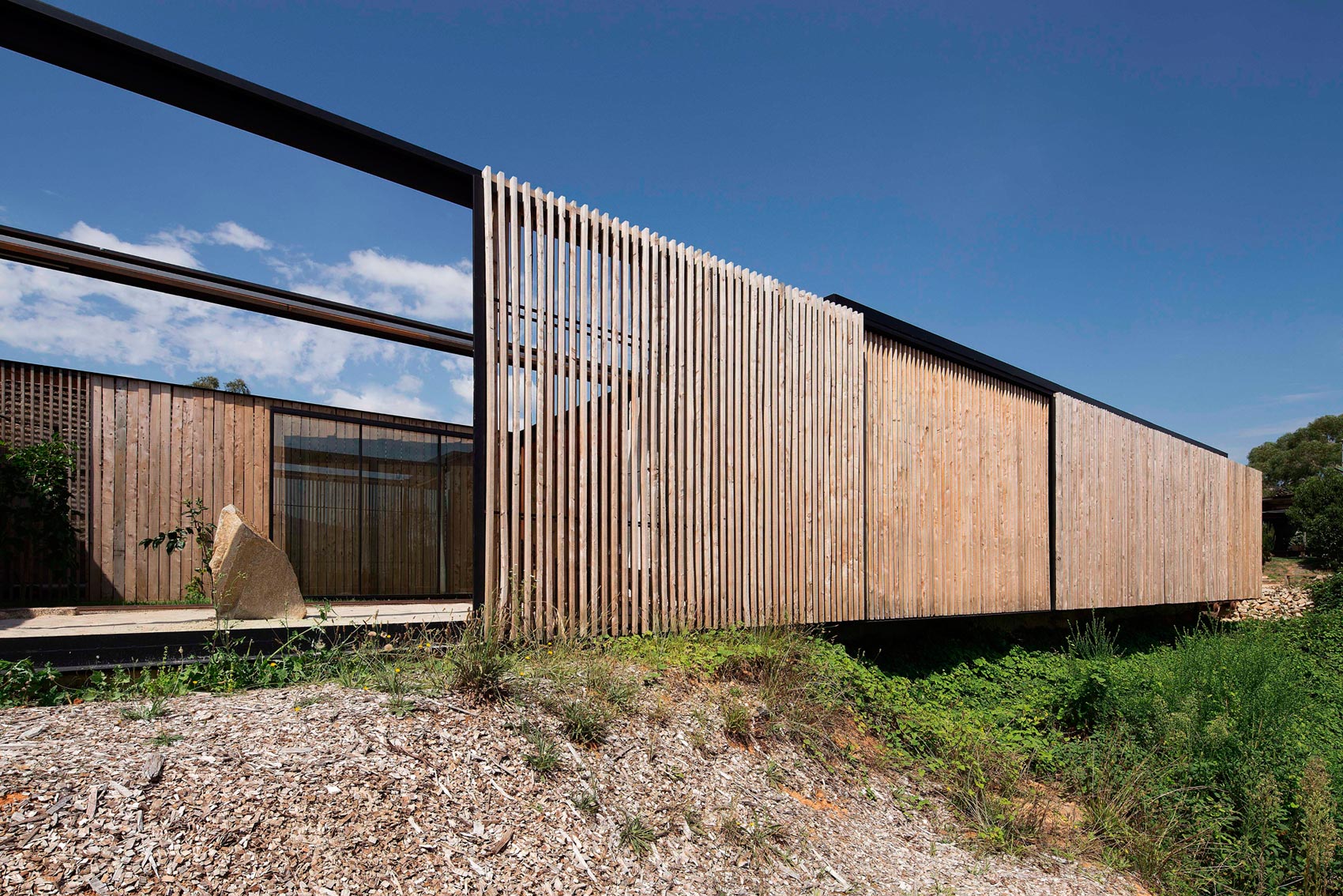 A Modern House Built From Reclaimed Concrete Blocks and Rough-Sawn Wood in Yackandandah, Australia by ARCHIER (9)