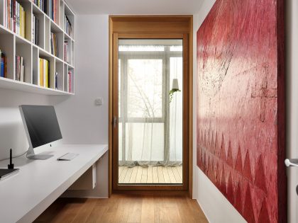 An Elegant L-Shaped Apartment with Walls of Modular Shelving and Storage in Ljubljana by Lidija Dragisic (16)