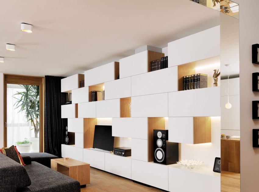 An Elegant L-Shaped Apartment with Walls of Modular Shelving and Storage in Ljubljana by Lidija Dragisic (2)
