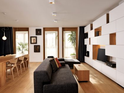 An Elegant L-Shaped Apartment with Walls of Modular Shelving and Storage in Ljubljana by Lidija Dragisic (3)