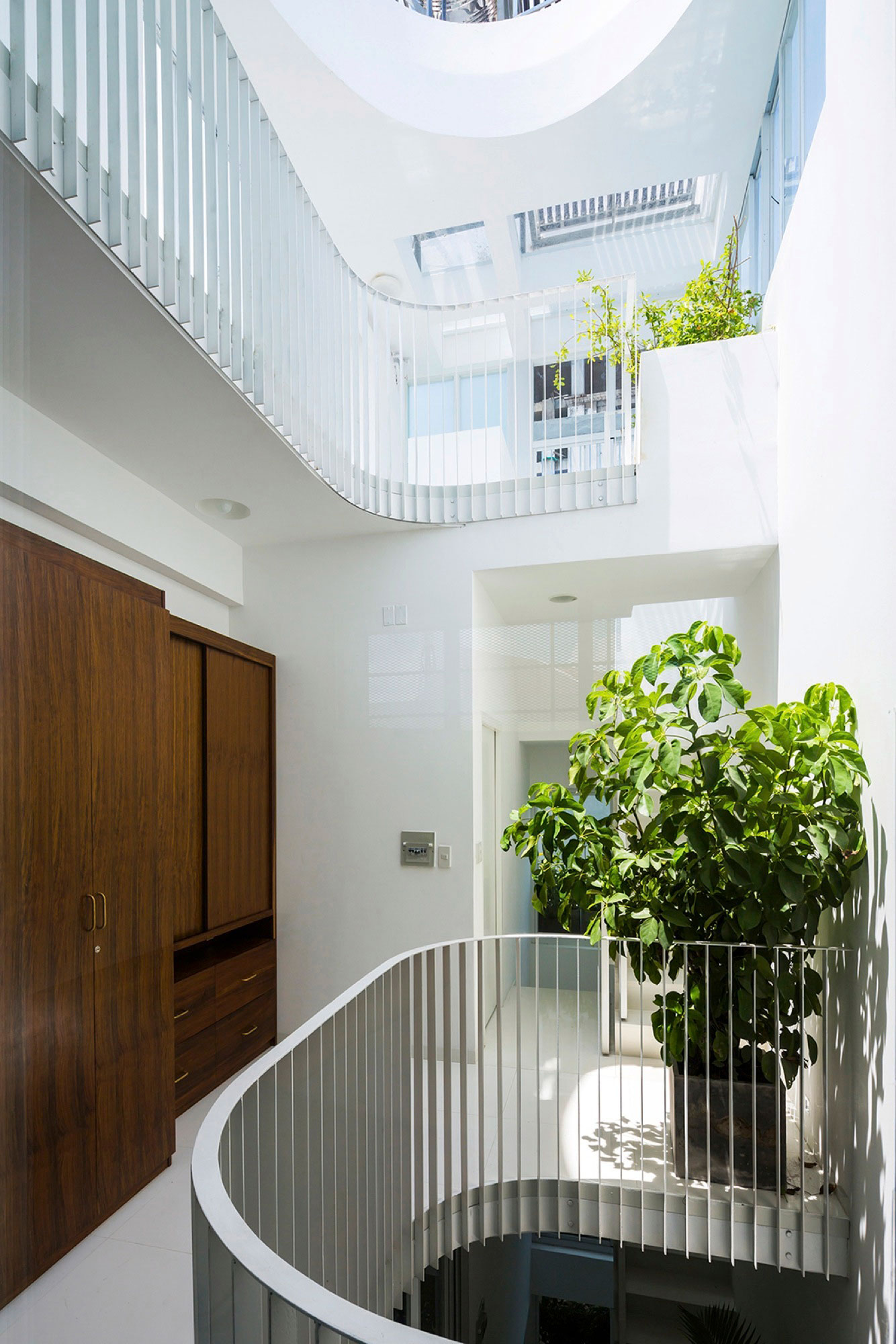 A Simple and Functional Vertical House with Contemporary Materials in Ho Chi Minh City by KIENTRUC O (10)