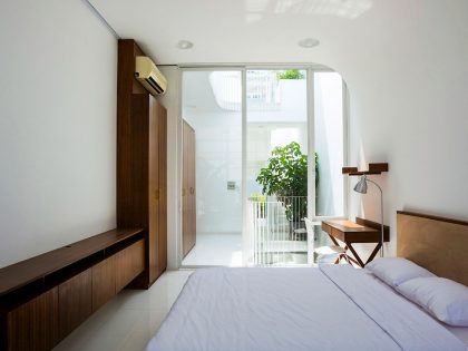 A Simple and Functional Vertical House with Contemporary Materials in Ho Chi Minh City by KIENTRUC O (12)