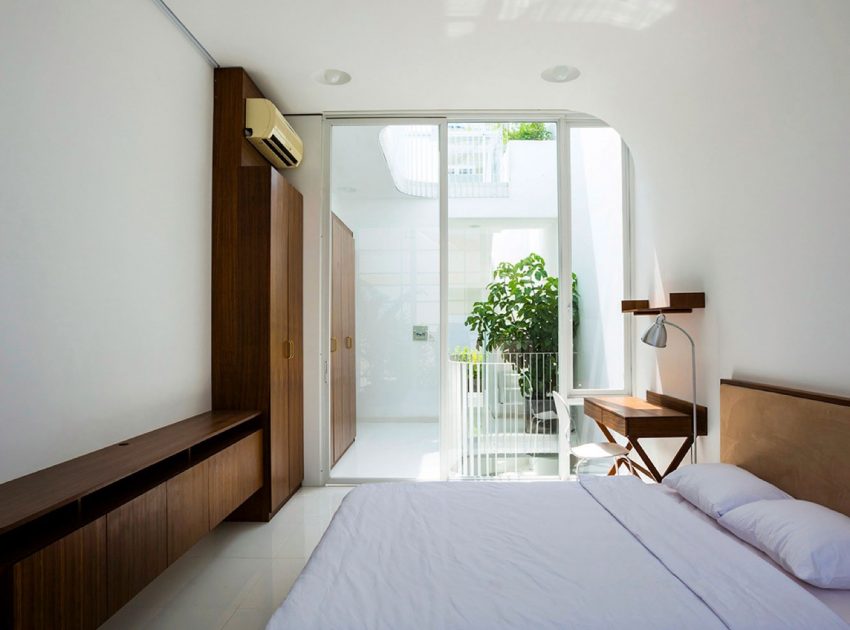 A Simple and Functional Vertical House with Contemporary Materials in Ho Chi Minh City by KIENTRUC O (12)