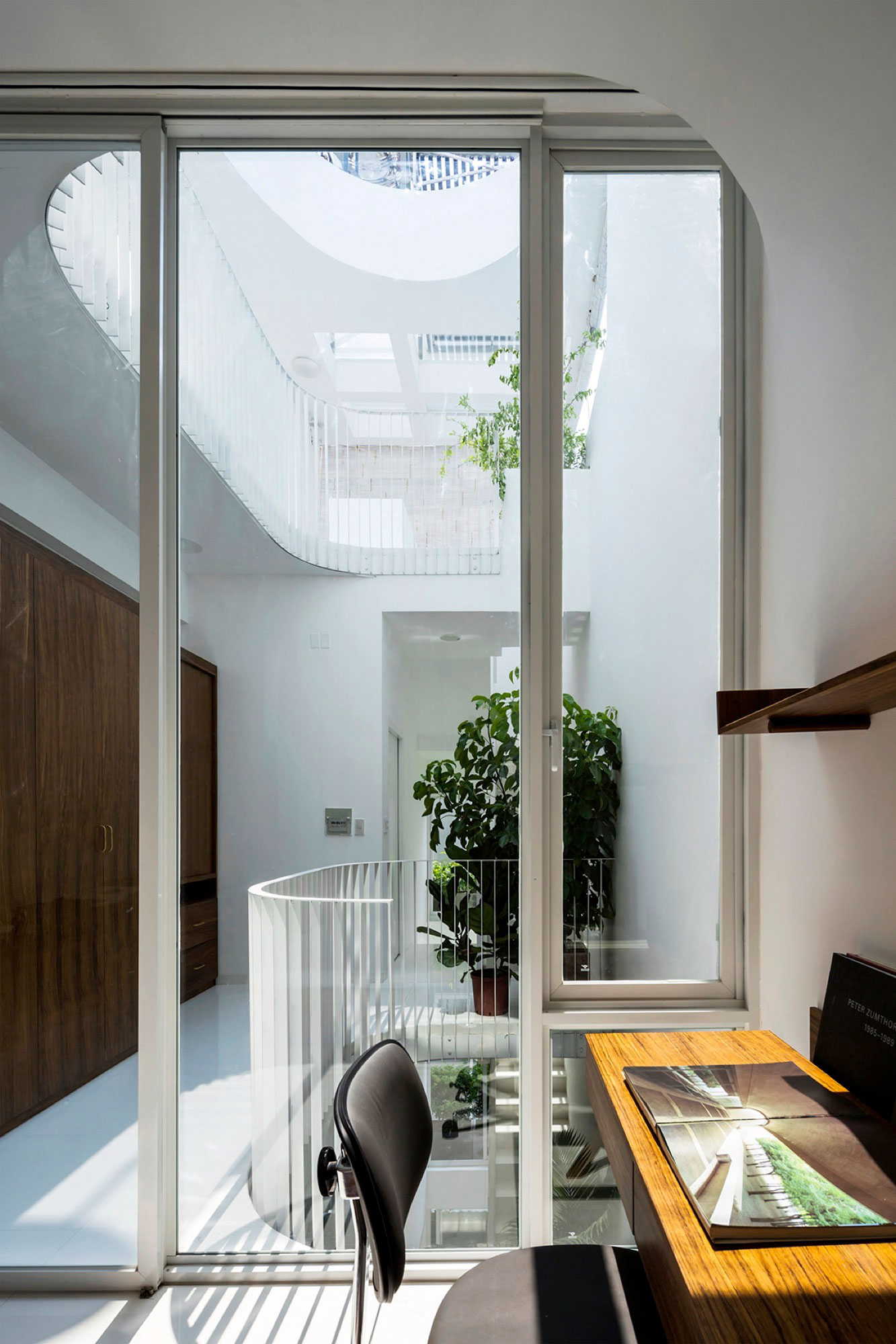 A Simple and Functional Vertical House with Contemporary Materials in Ho Chi Minh City by KIENTRUC O (14)