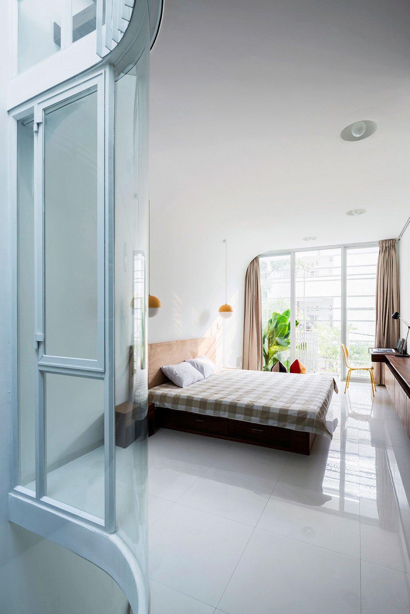 A Simple and Functional Vertical House with Contemporary Materials in Ho Chi Minh City by KIENTRUC O (15)