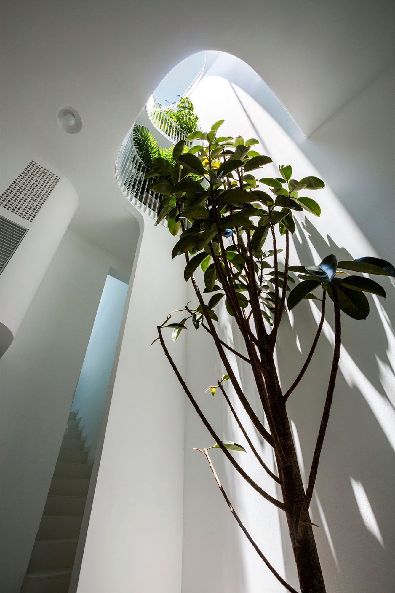 A Simple and Functional Vertical House with Contemporary Materials in Ho Chi Minh City by KIENTRUC O (6)