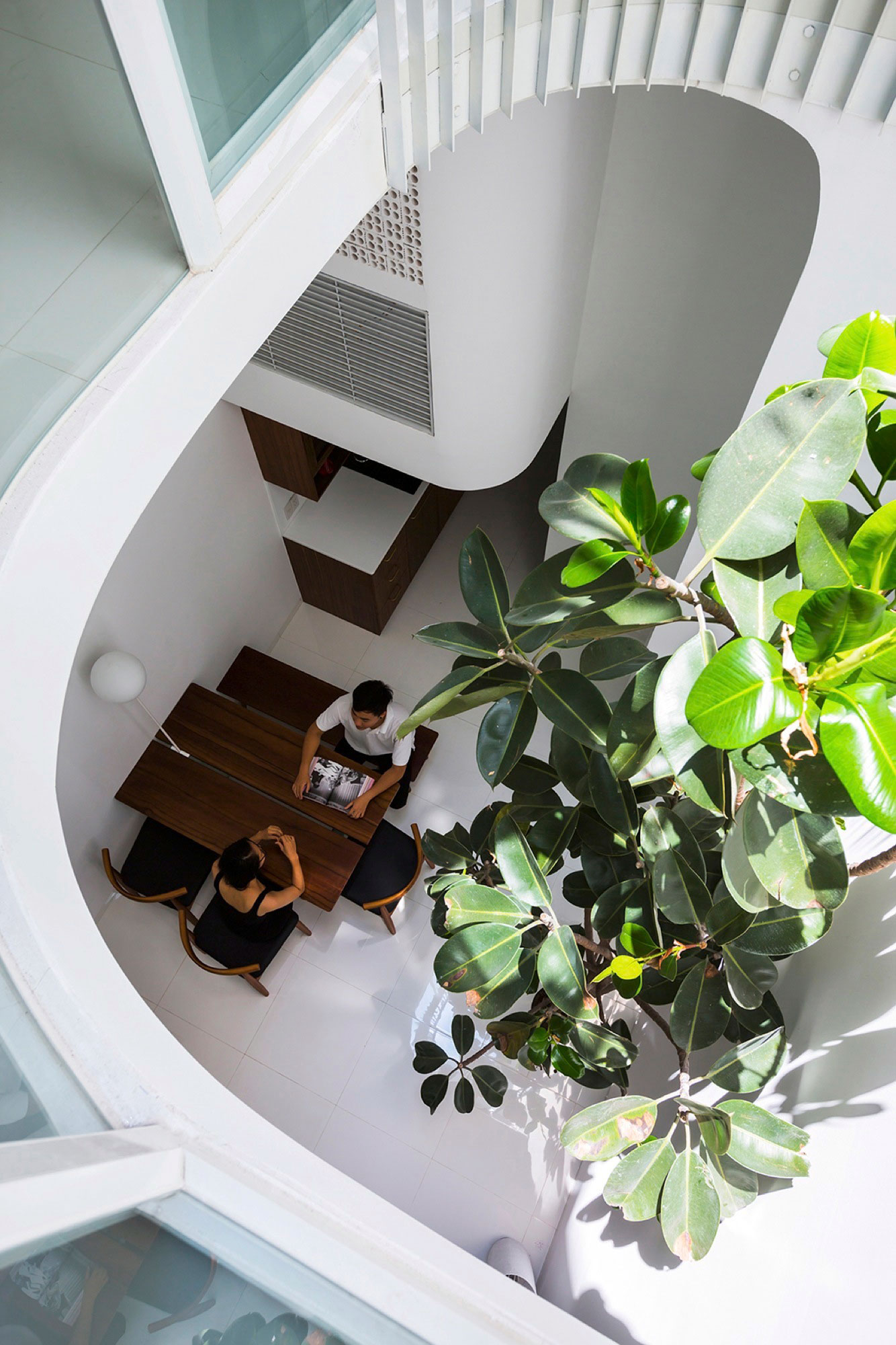 A Simple and Functional Vertical House with Contemporary Materials in Ho Chi Minh City by KIENTRUC O (7)