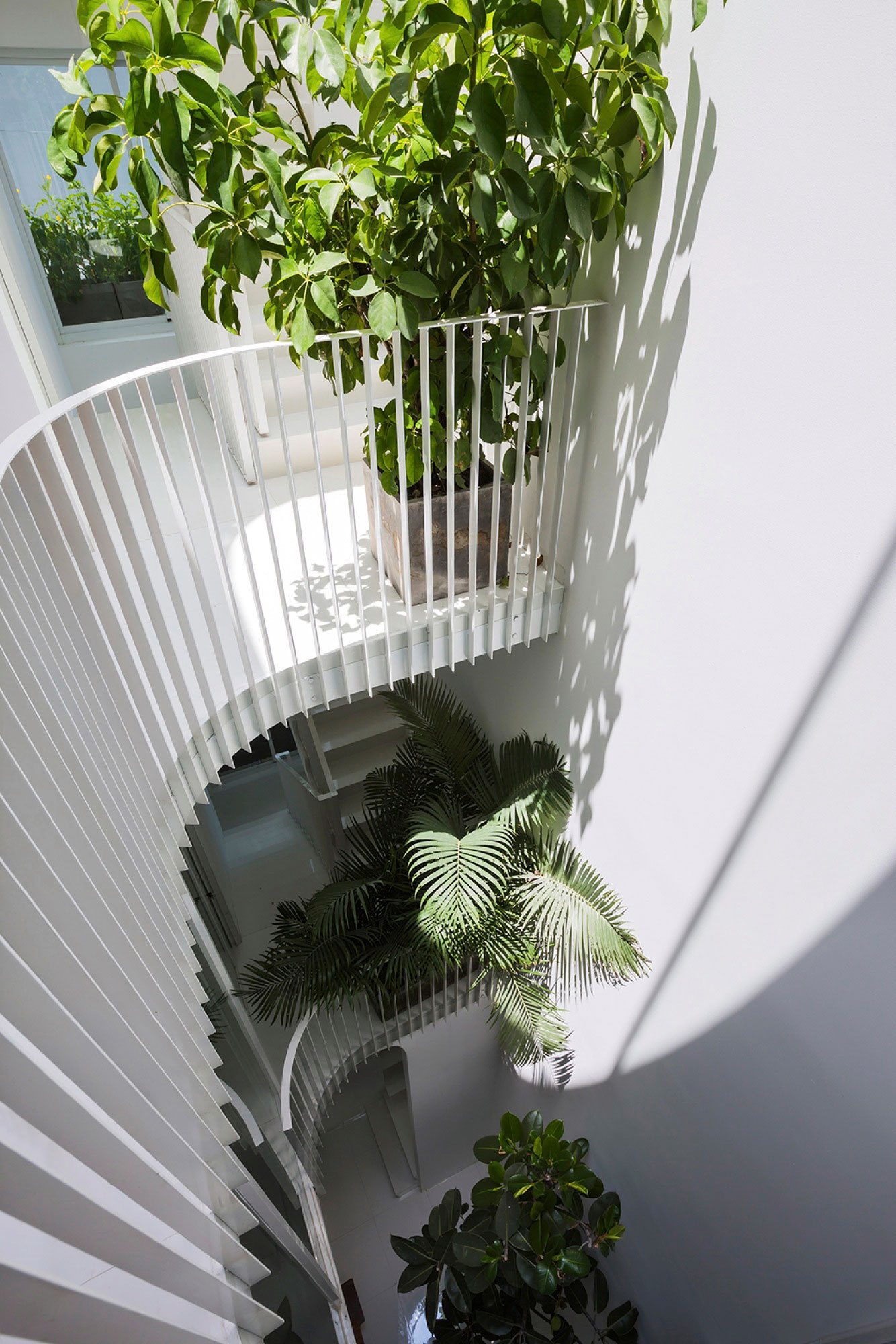 A Simple and Functional Vertical House with Contemporary Materials in Ho Chi Minh City by KIENTRUC O (9)