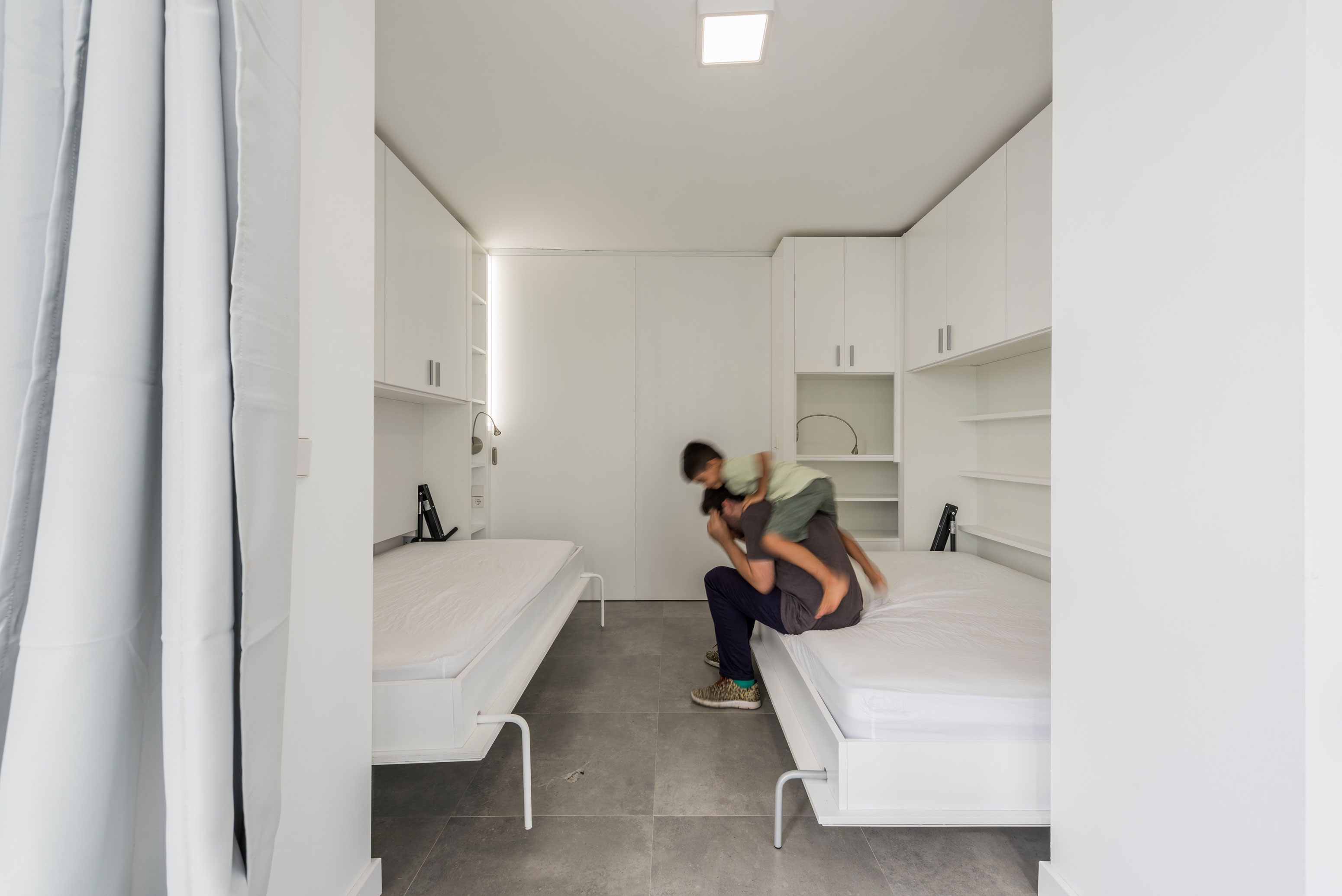 A Small Contemporary Home with Rotating Walls in Salinas, Spain by PKMN Architectures (19)