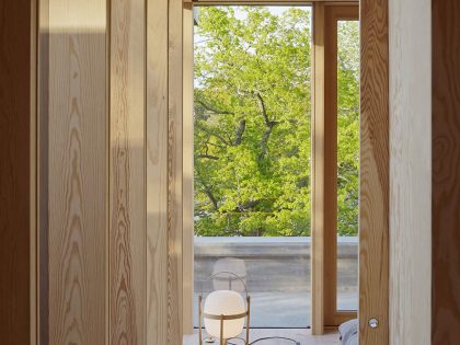 A Small Steel, Wood and Glass House Built on Steep Slope with Infinity Pool in Aspvik by Andreas Martin-Löf Arkitekter (11)