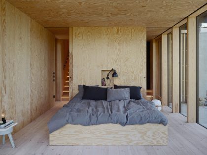 A Small Steel, Wood and Glass House Built on Steep Slope with Infinity Pool in Aspvik by Andreas Martin-Löf Arkitekter (12)