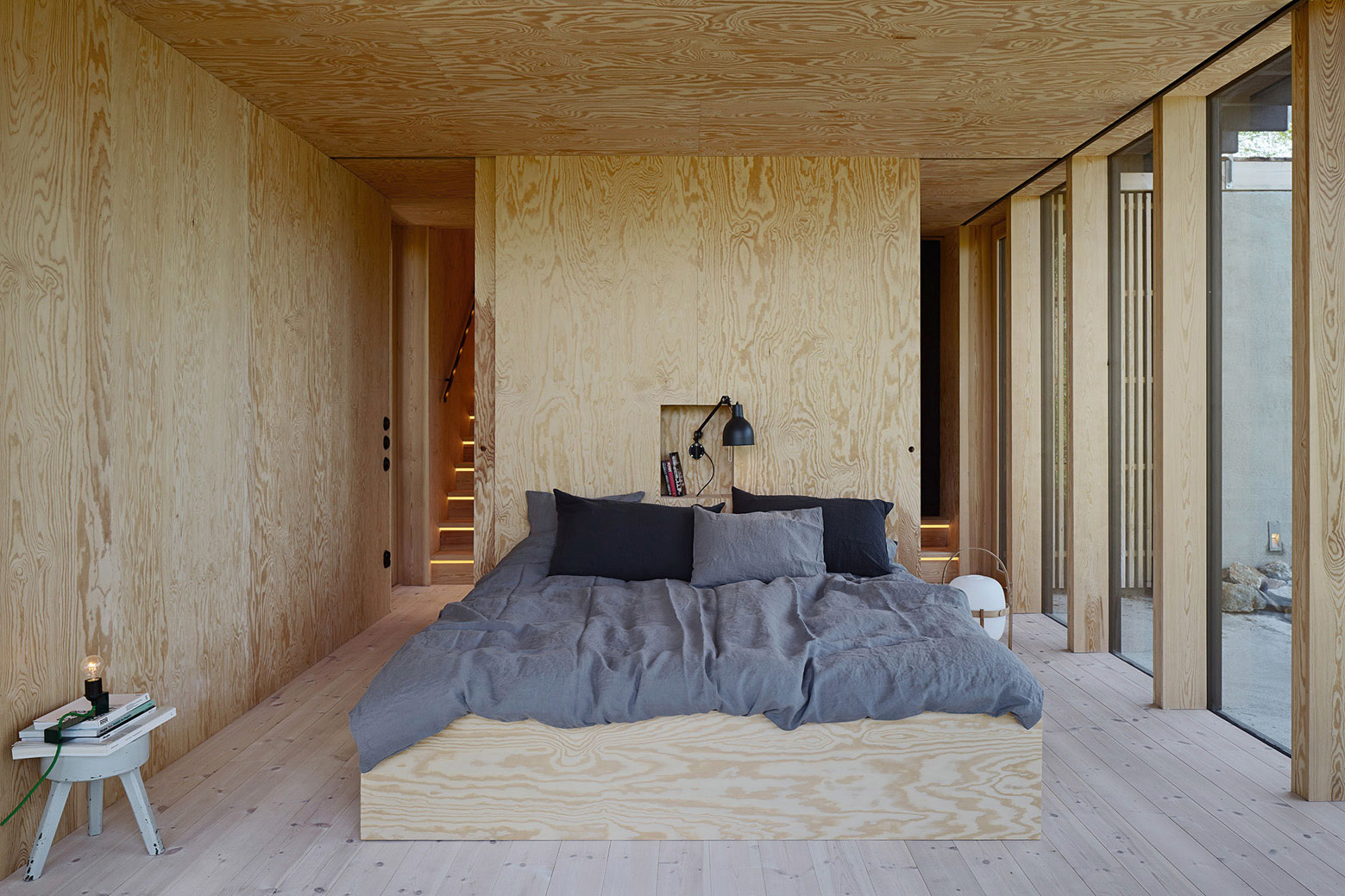 A Small Steel, Wood and Glass House Built on Steep Slope with Infinity Pool in Aspvik by Andreas Martin-Löf Arkitekter (12)