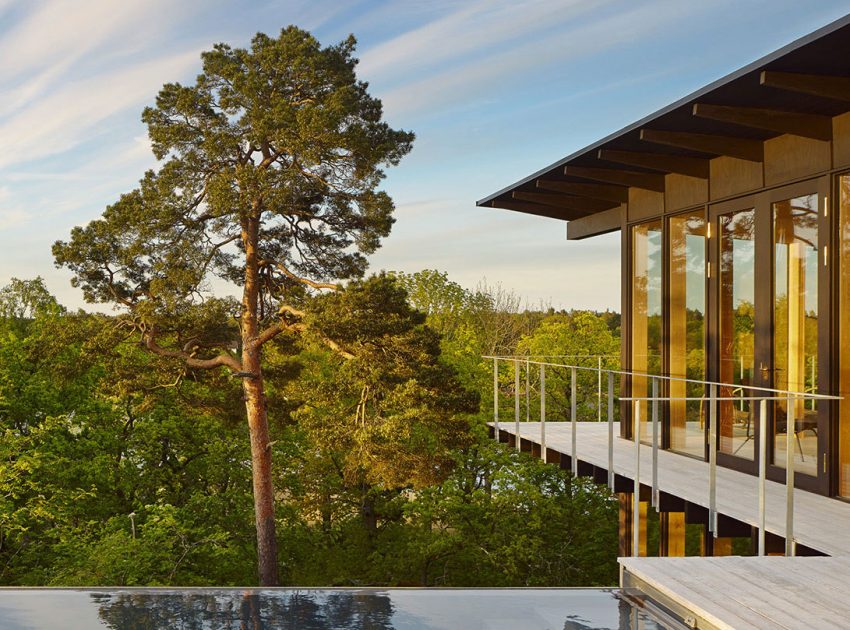 A Small Steel, Wood and Glass House Built on Steep Slope with Infinity Pool in Aspvik by Andreas Martin-Löf Arkitekter (2)