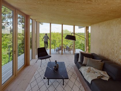 A Small Steel, Wood and Glass House Built on Steep Slope with Infinity Pool in Aspvik by Andreas Martin-Löf Arkitekter (5)