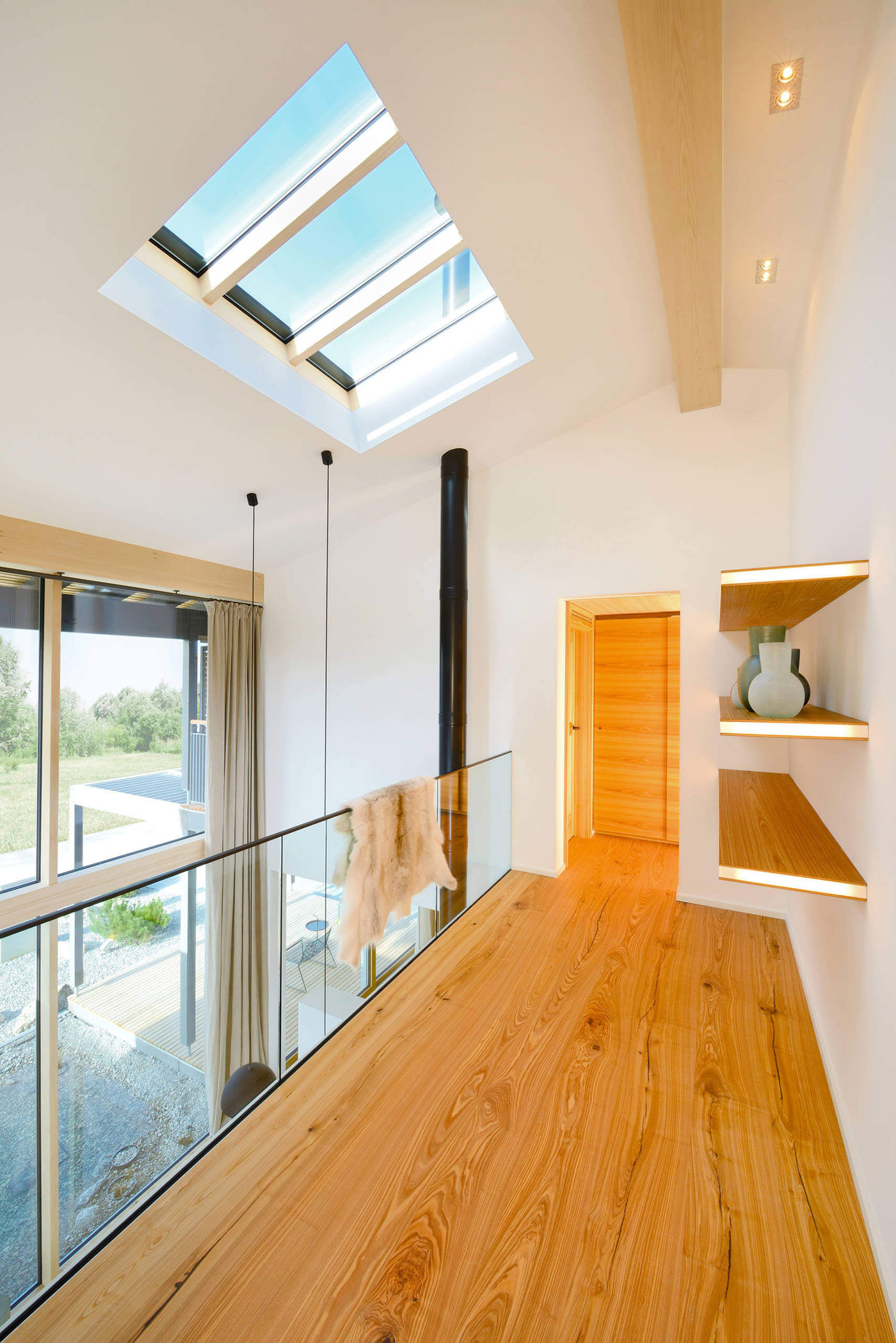 A Smart Contemporary Home with an Eco-Friendly and Luminous Character in Poing, Germany by Bau-Fritz (5)