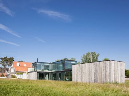 A Spacious Contemporary Home Finished with Concrete, Metal Mesh and Glass in Knokke by Govaert & Vanhoutte Architects (1)