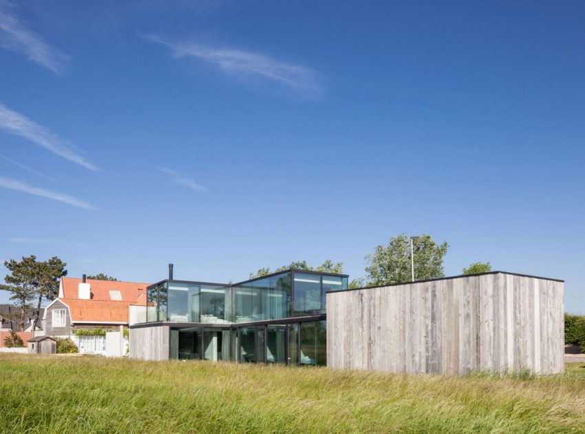 A Spacious Contemporary Home Finished with Concrete, Metal Mesh and Glass in Knokke by Govaert & Vanhoutte Architects (1)