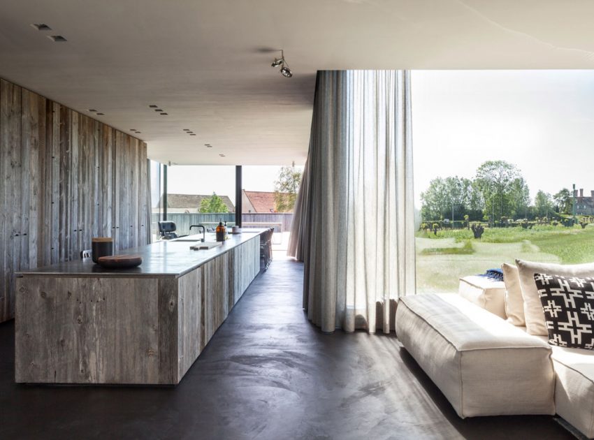 A Spacious Contemporary Home Finished with Concrete, Metal Mesh and Glass in Knokke by Govaert & Vanhoutte Architects (10)