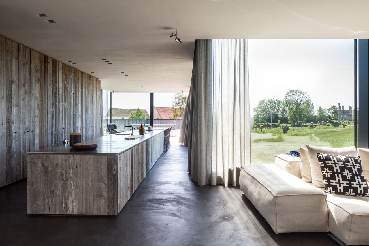 A Spacious Contemporary Home Finished with Concrete, Metal Mesh and Glass in Knokke by Govaert & Vanhoutte Architects (10)