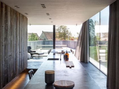 A Spacious Contemporary Home Finished with Concrete, Metal Mesh and Glass in Knokke by Govaert & Vanhoutte Architects (11)