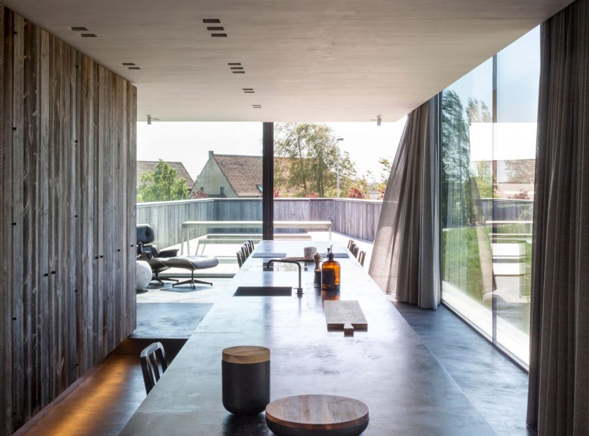 A Spacious Contemporary Home Finished with Concrete, Metal Mesh and Glass in Knokke by Govaert & Vanhoutte Architects (11)
