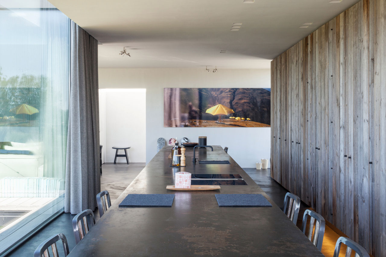 A Spacious Contemporary Home Finished with Concrete, Metal Mesh and Glass in Knokke by Govaert & Vanhoutte Architects (12)