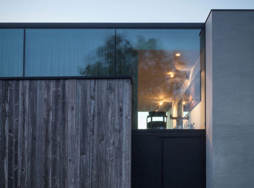 A Spacious Contemporary Home Finished with Concrete, Metal Mesh and Glass in Knokke by Govaert & Vanhoutte Architects (19)