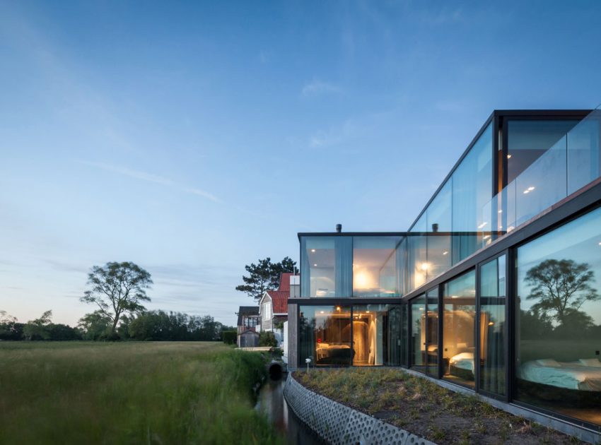 A Spacious Contemporary Home Finished with Concrete, Metal Mesh and Glass in Knokke by Govaert & Vanhoutte Architects (20)